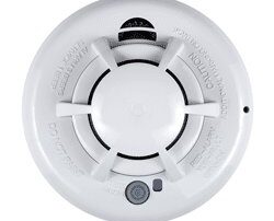 Smart Home Smoke Detectors 7 a white smoke detector with a button